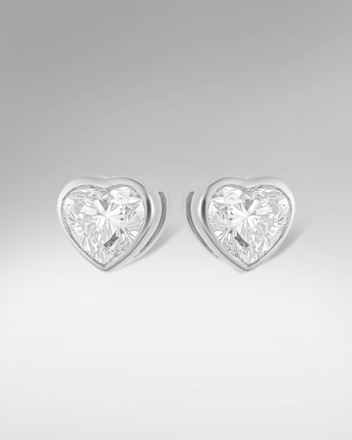 14k White Gold Solitaire Heart Shape Diamond Studs at Lucid Diamond Co. Dallas Fine Jewelry