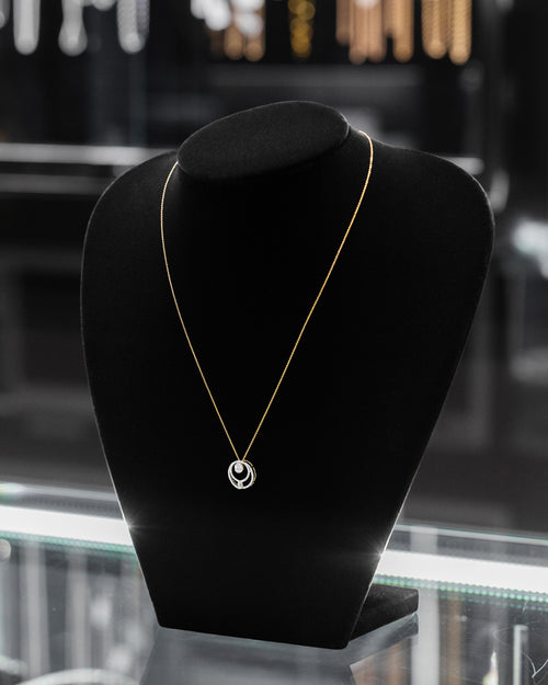 Women's Baguette and Round Diamond Circular Necklace at Lucid Diamond Co.