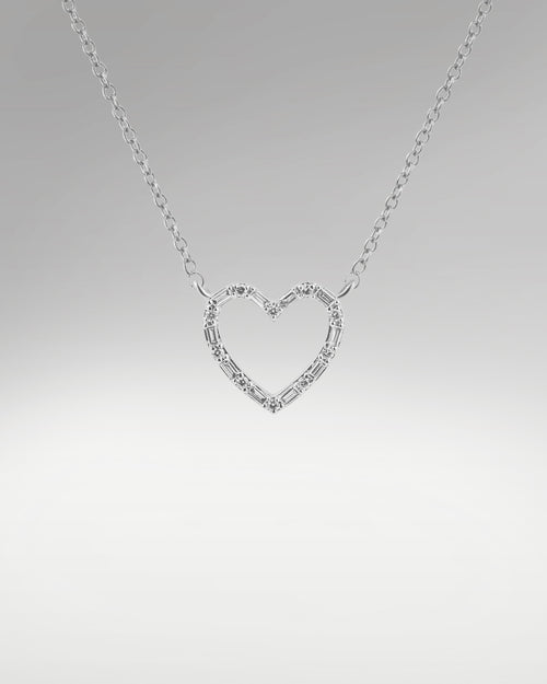 Women's Baguette and Round Heart Shaped Diamont Pendant at Lucid Diamond Co.