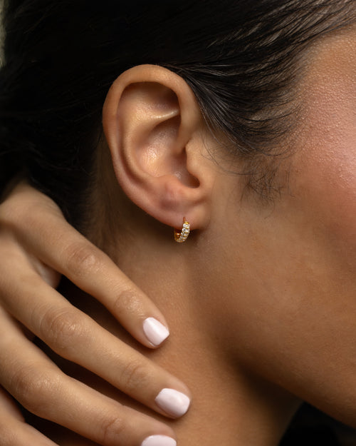 10k Yellow Gold Diamond Hoop Huggie Earrings at Lucid Diamond Co.