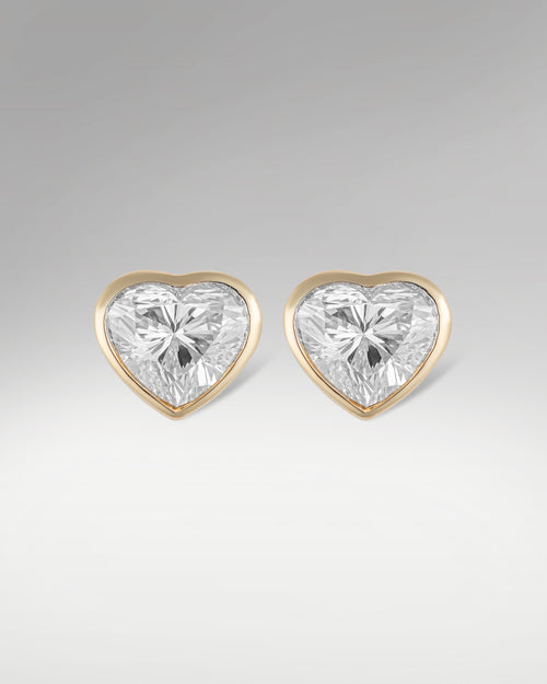 14k Yellow Gold Solitaire Heart Shape Diamond Studs at Lucid Diamond Co. Dallas